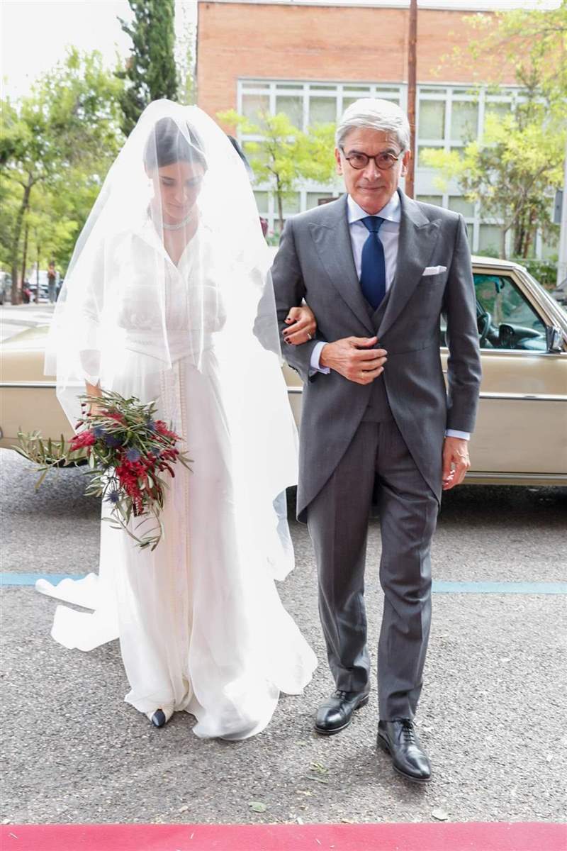 Lucía Martín, con su padre y padrino