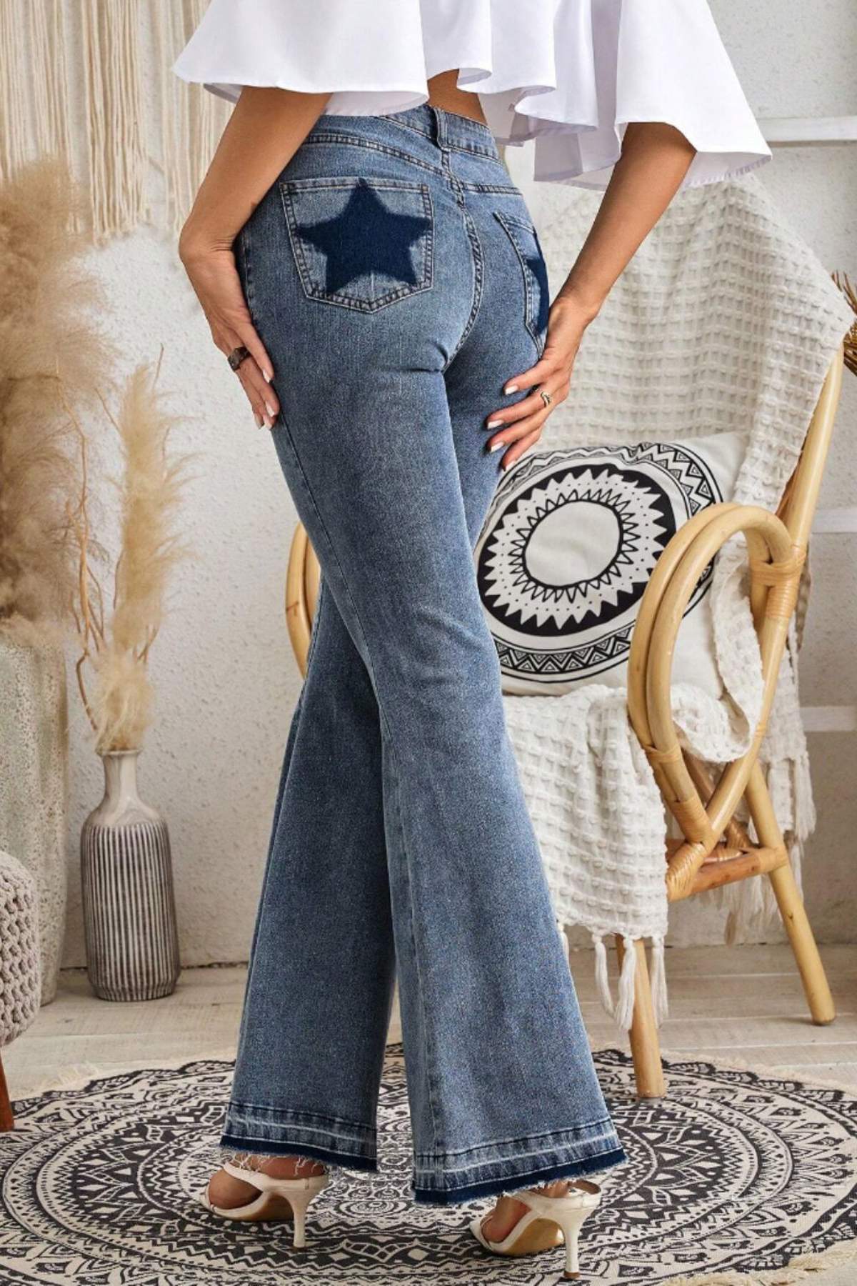 Jeans con estampado de estrellas