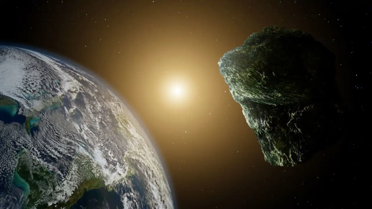 Imagen de un asteroide y el planeta Tierra