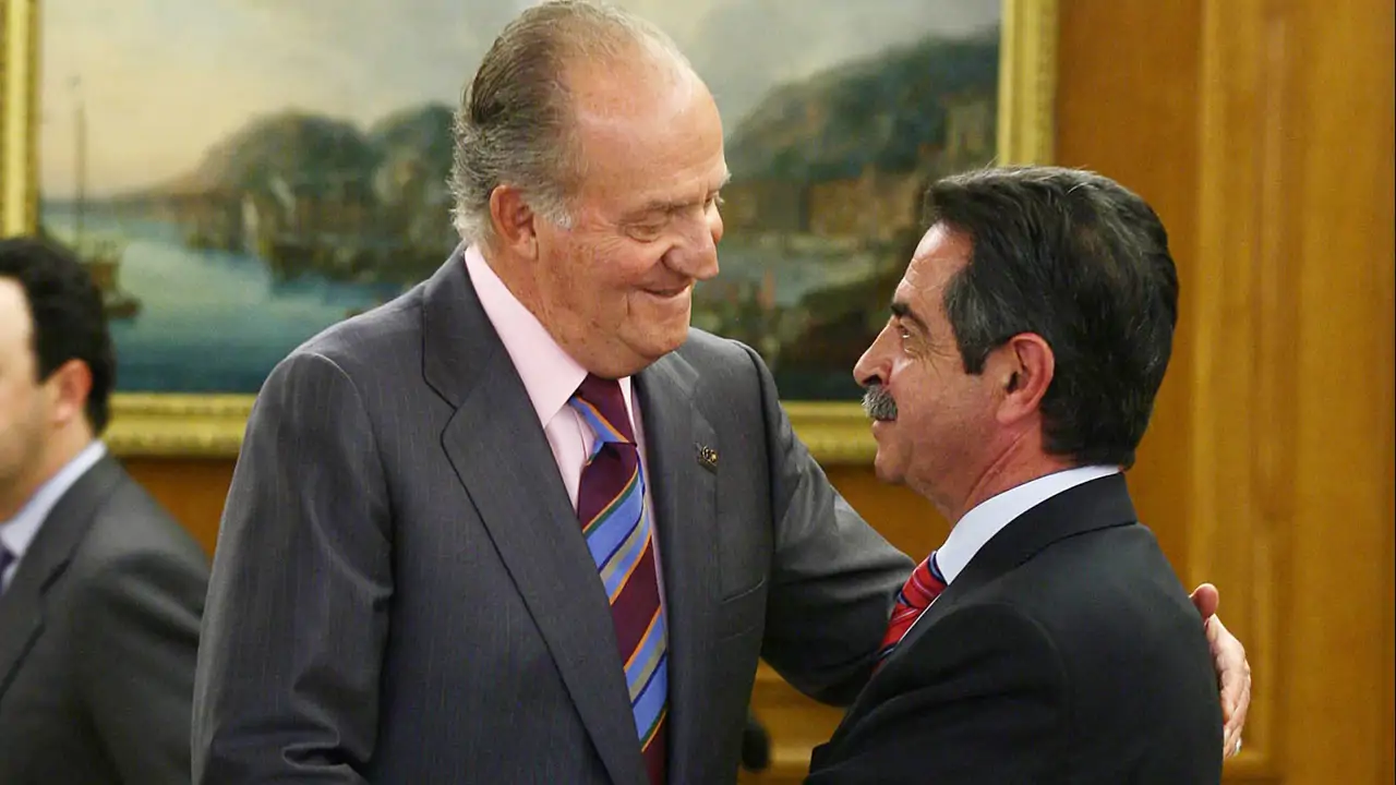 Rey Juan Carlos y Revilla