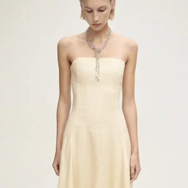 Vestido de lino bajo abullonado de Mango