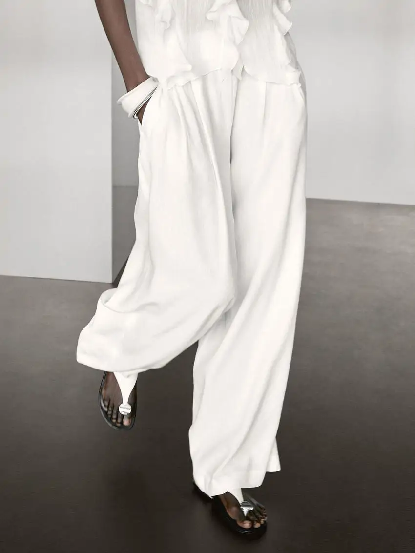 Pantalón palazzo pinzas con lino de Massimo Dutti
